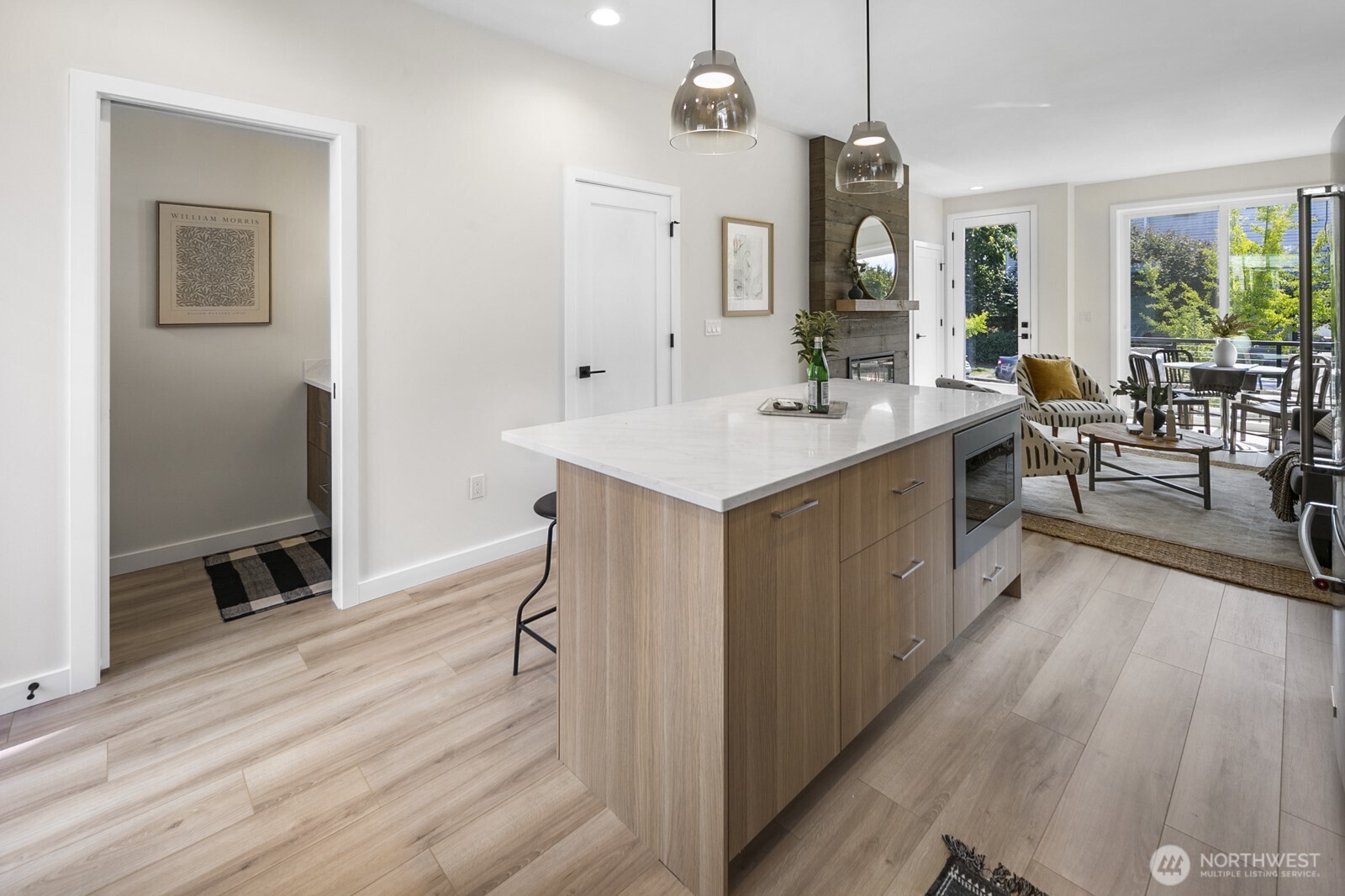 1748 Northwest 62nd Street Seattle, WA 98107 - Photo 10 of 33 a view of living room with granite countertop furniture and wooden floor