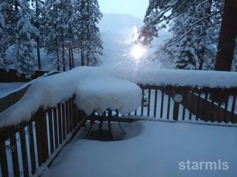 a view of balcony with furniture