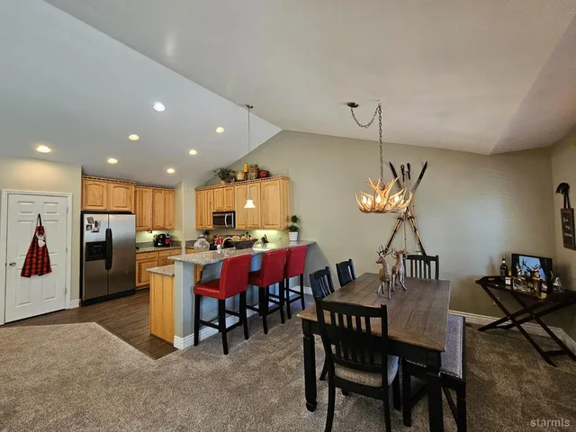 a view of a dining room with furniture