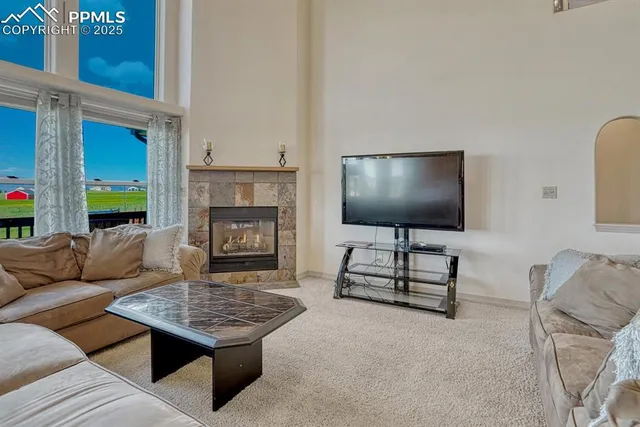 a bedroom with a bed and flat screen tv