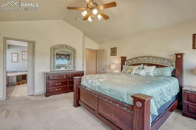 a spacious bathroom with a granite countertop tub sink and mirror