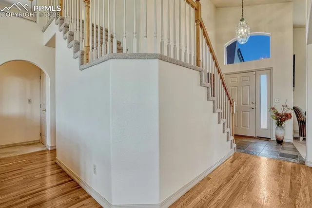 a living room with furniture a couch and a table