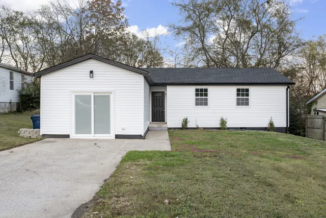 a front view of house with yard
