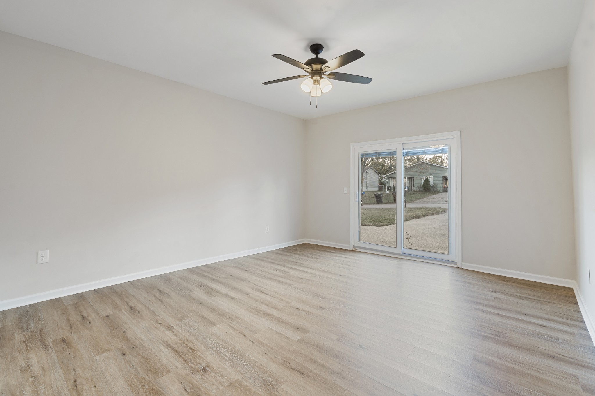 1021 Mallow Drive Madison, TN 37115 - Photo 6 of 13 wooden floor in an empty room with a window