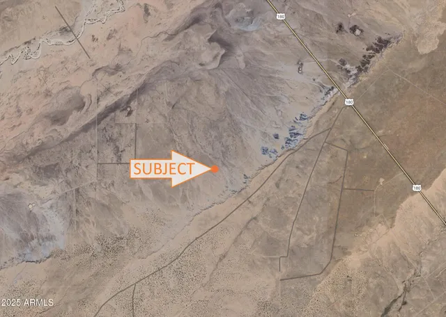 a view of a dry yard with stairs