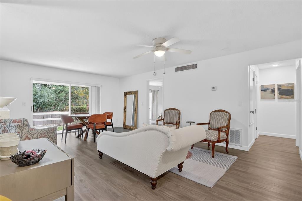 600 Northern Way, Unit 303 Winter Springs, FL 32708 - Photo 7 of 25 a living room with furniture rug and window