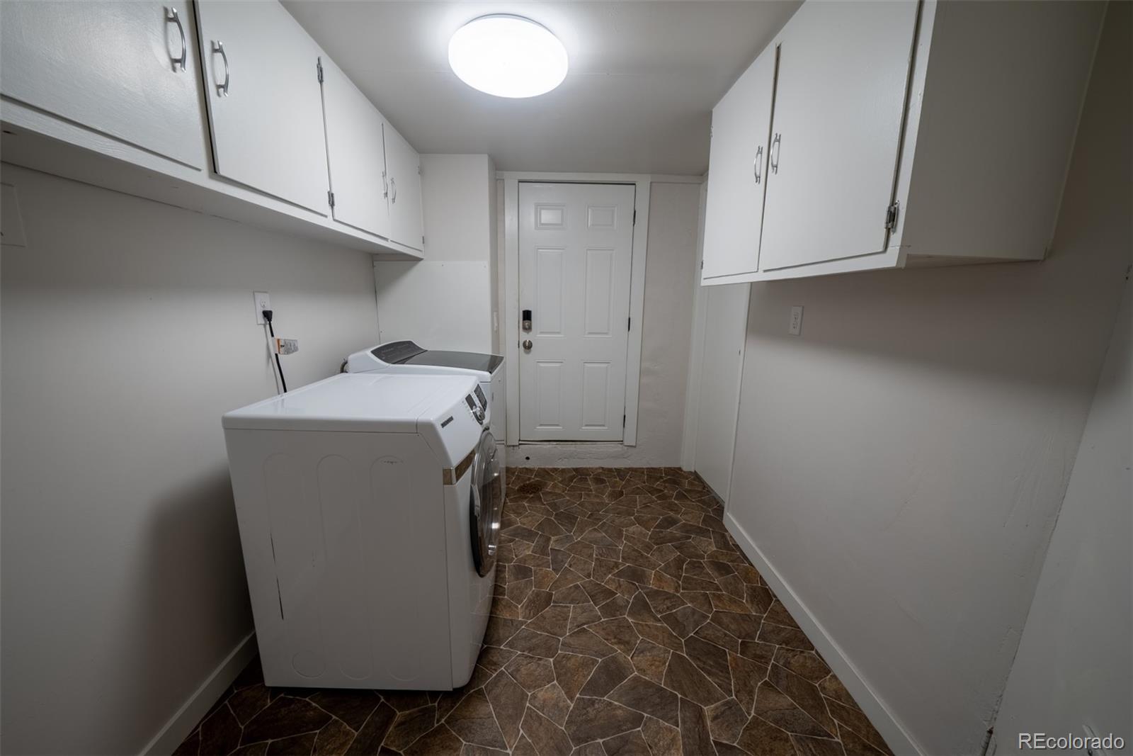 4947 South Perry Street Littleton, CO 80123 - Photo 11 of 24 a utility room with dryer and washer
