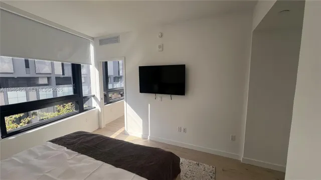 $940,000 | 225 North Miami Avenue, Unit 212, Miami, FL 33128