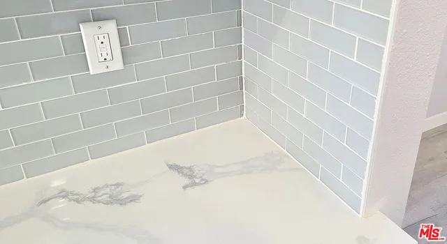 a view of a room with empty shelves