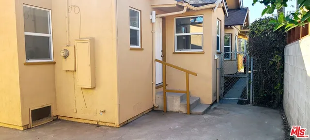 a view of a bathroom from a hallway