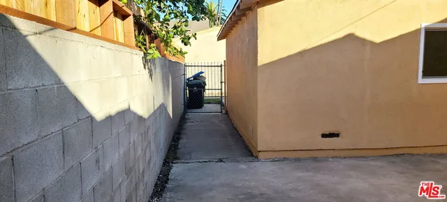 a view of a backyard of the house