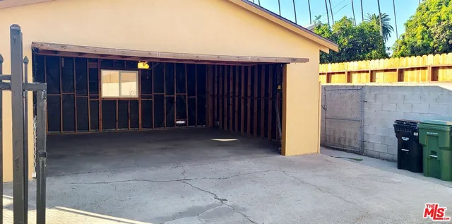 a view of a room with wooden walls