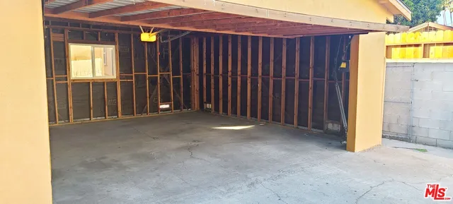 a view of balcony with a palm tree