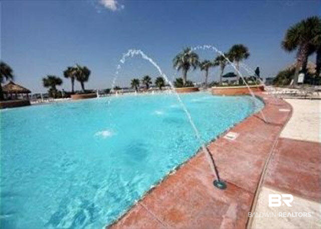 28107 Perdido Beach Boulevard, Unit DP14 Orange Beach, AL 36561 - Photo 20 of 32 Lots of fun to be had at Caribe outdoor pool