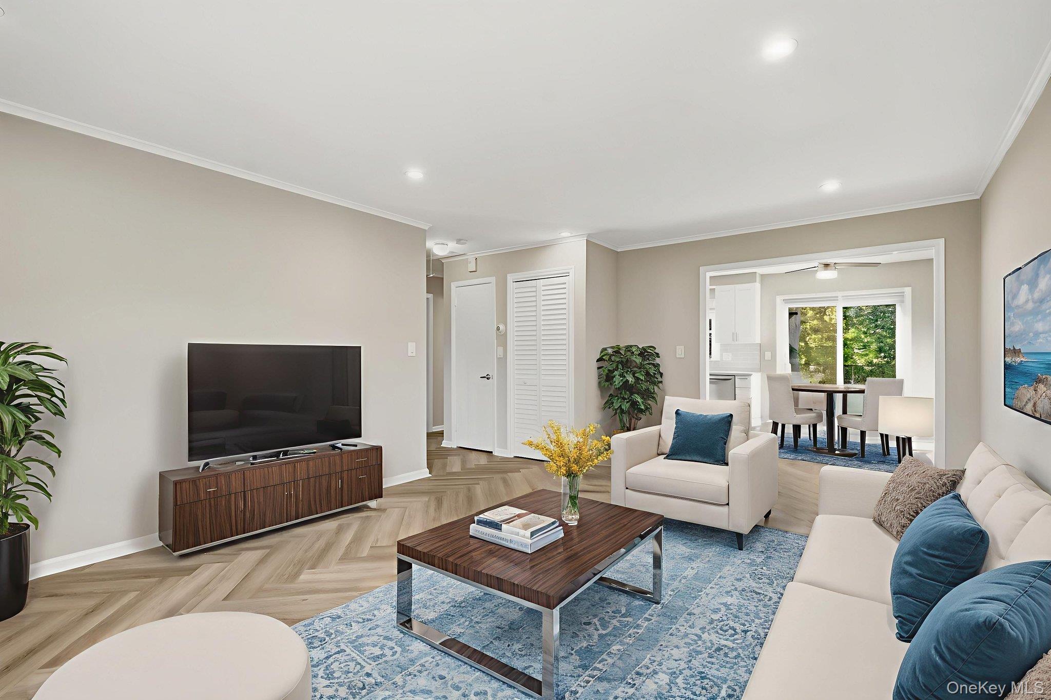 23 Young Place, Unit 2 Tuckahoe, NY 10707 - Photo 1 of 20 a living room with furniture and a flat screen tv