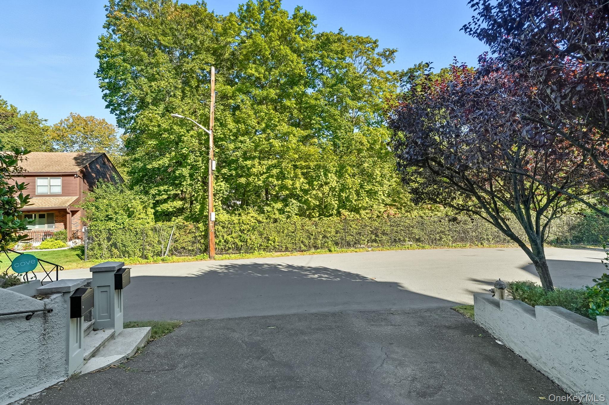 23 Young Place, Unit 2 Tuckahoe, NY 10707 - Photo 18 of 20 a view of an outdoor space and a yard