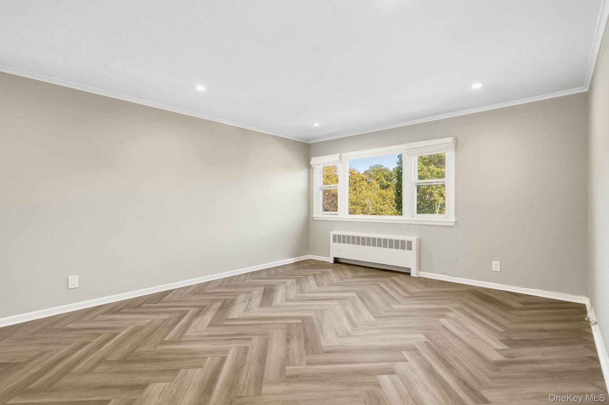 23 Young Place, Unit 2 Tuckahoe, NY 10707 - Photo 3 of 20 a view of an empty room with a window
