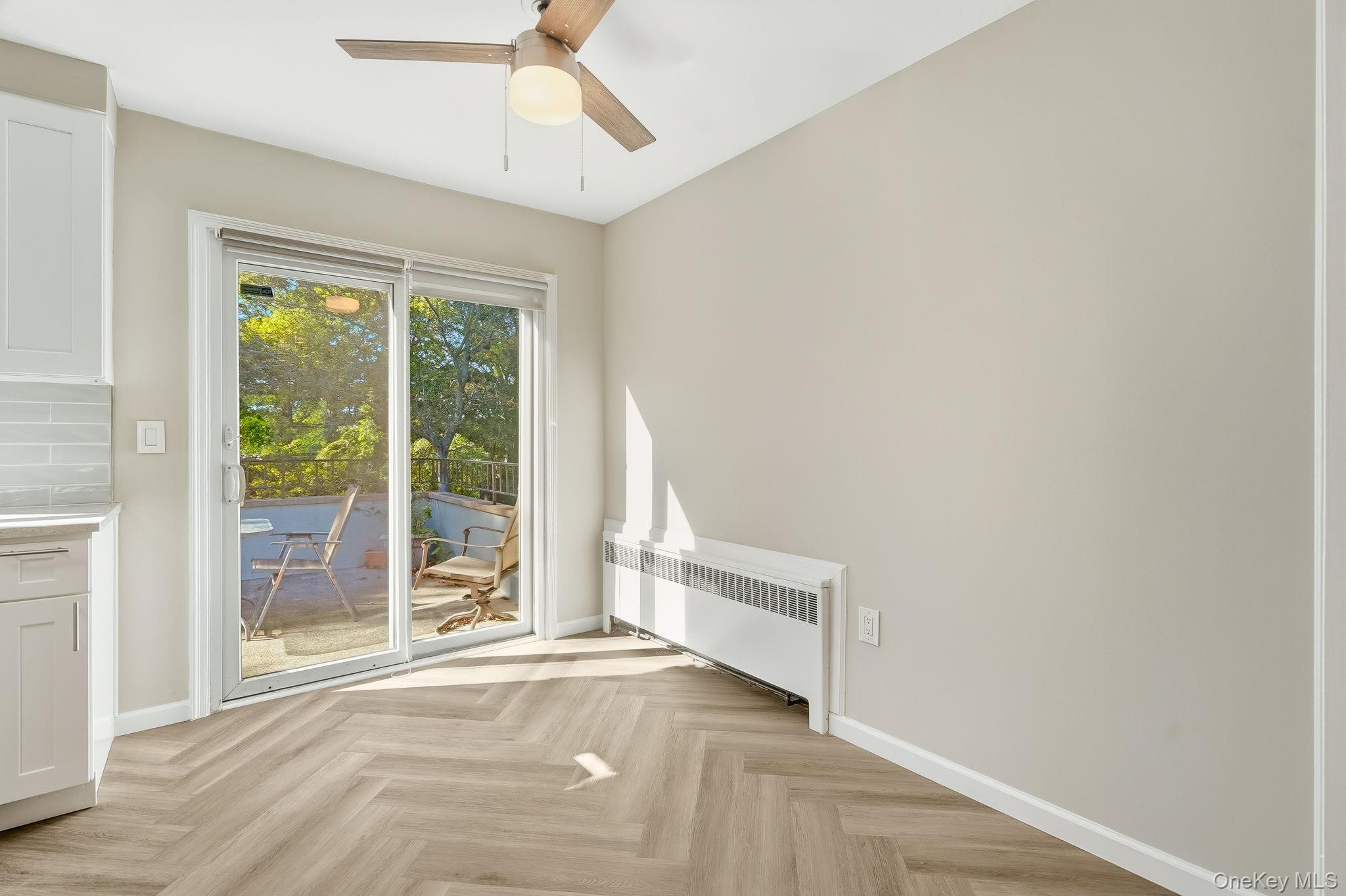 23 Young Place, Unit 2 Tuckahoe, NY 10707 - Photo 4 of 20 a view of an empty room with a window