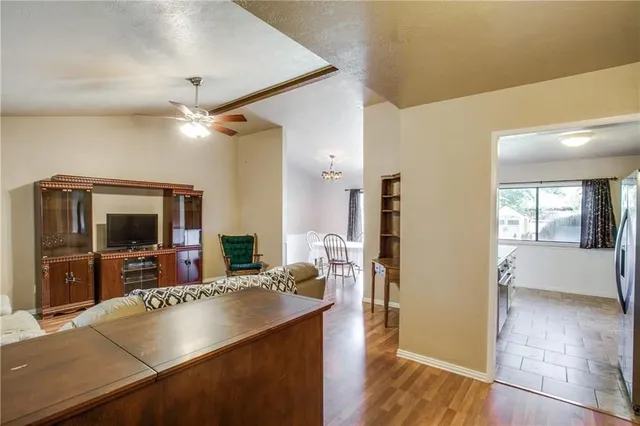 a view of living room and kitchen with furniture