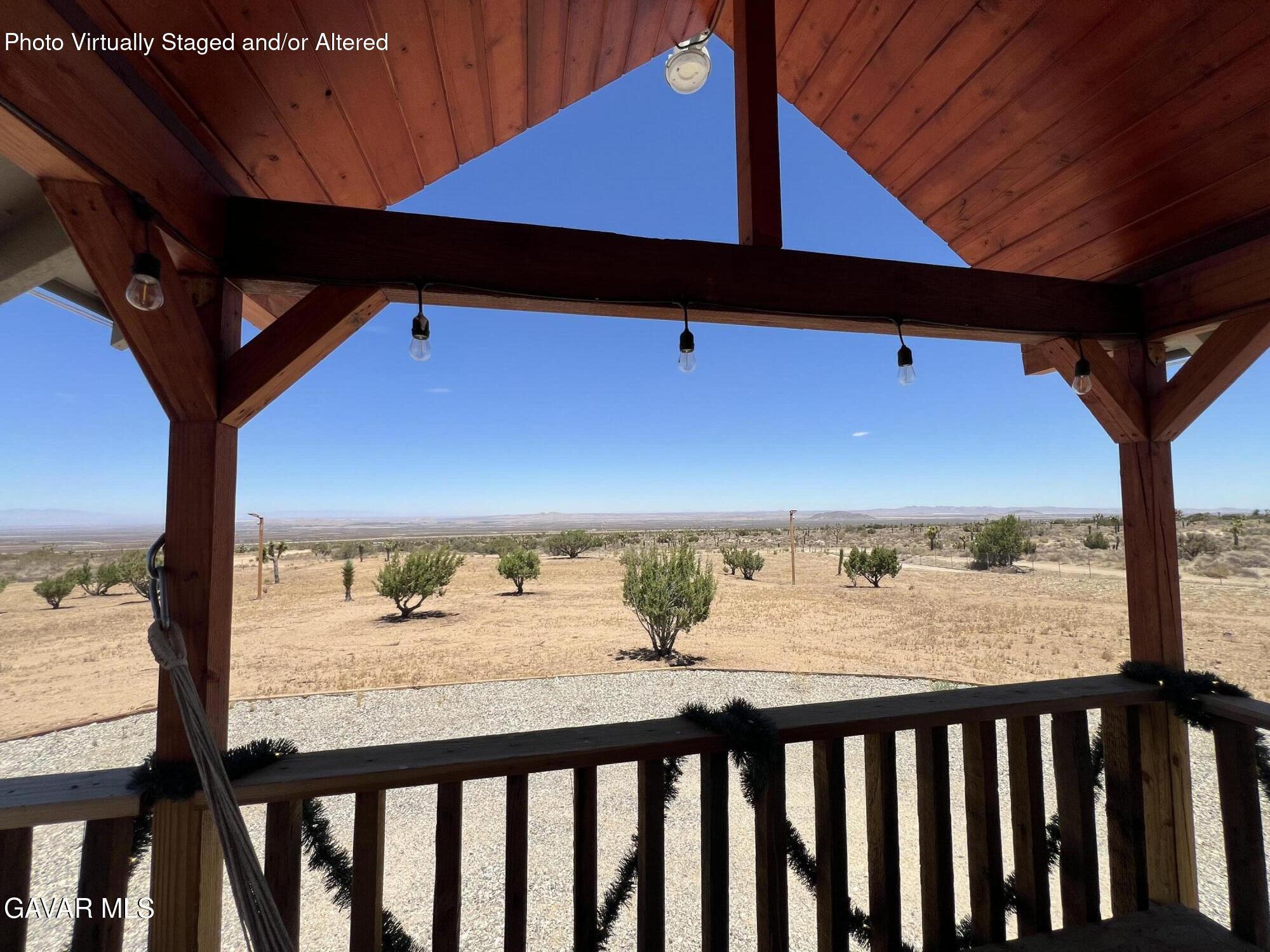 200 Ave Y/fort Tejon Road Llano, CA 93544 - Photo 2 of 30 a view of a balcony with wooden fence