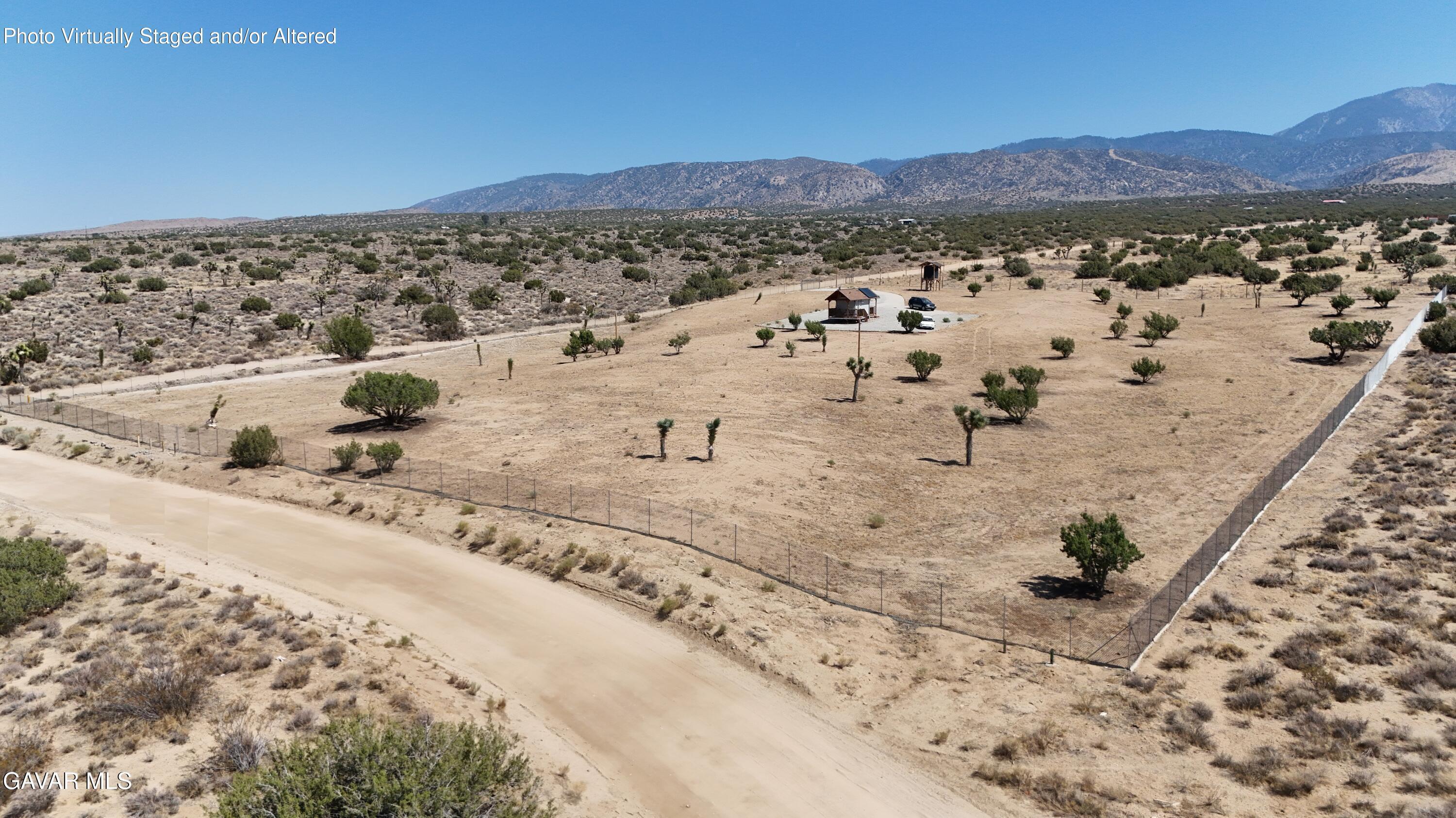200 Ave Y/fort Tejon Road Llano, CA 93544 - Photo 25 of 30 a view of a terrace with a mountain