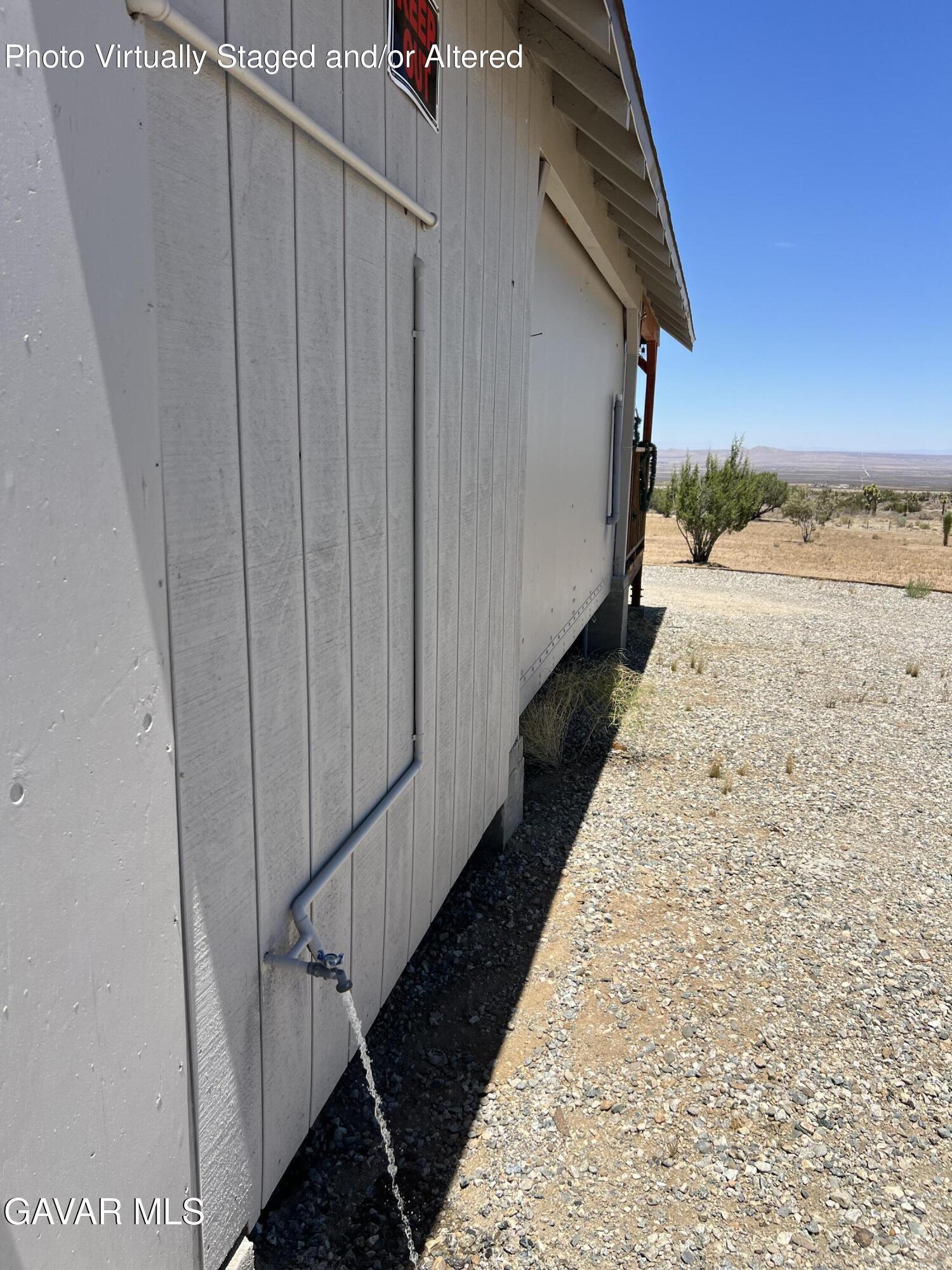 200 Ave Y/fort Tejon Road Llano, CA 93544 - Photo 7 of 30 a view of a back yard of the house