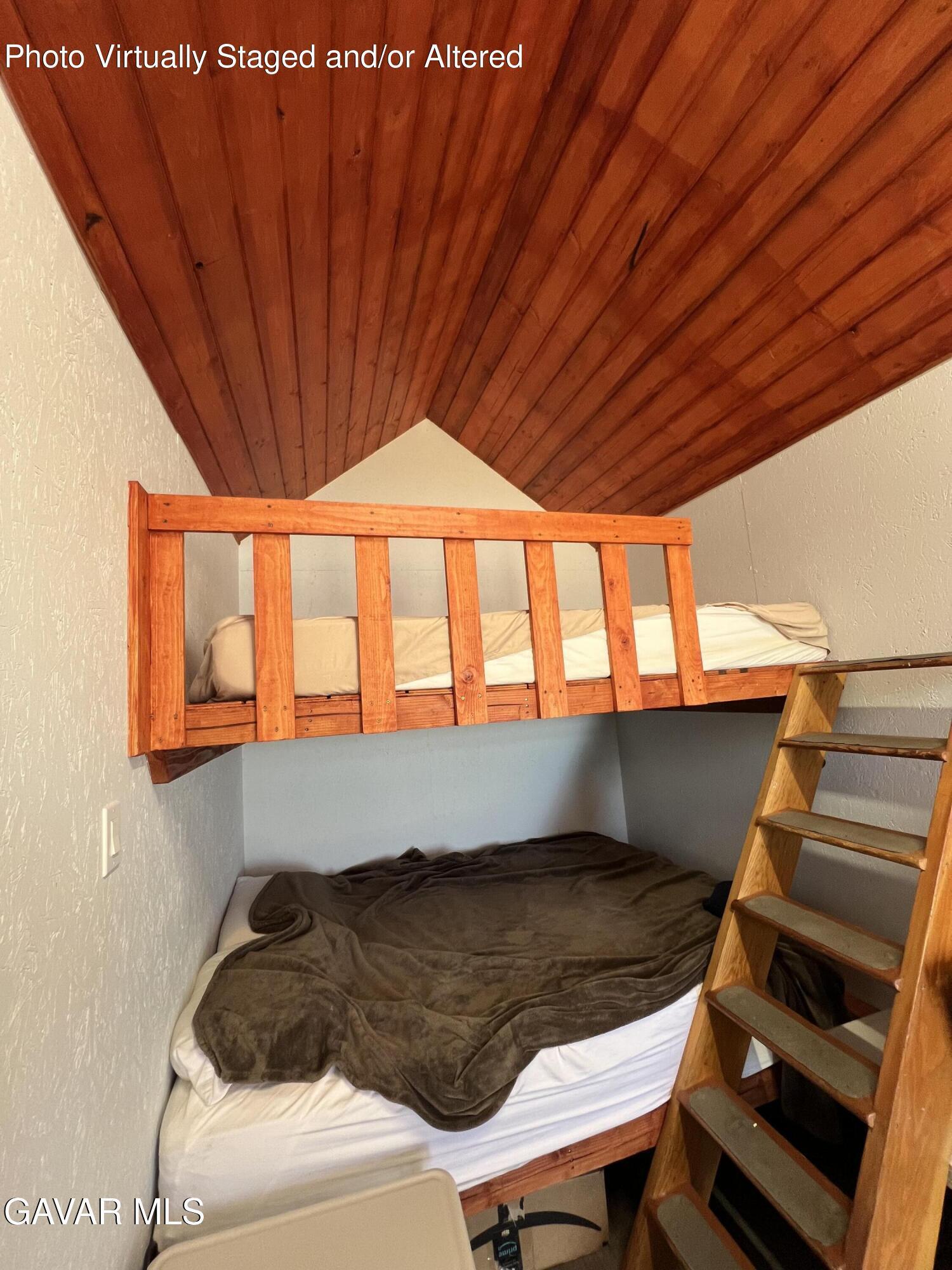 200 Ave Y/fort Tejon Road Llano, CA 93544 - Photo 9 of 30 a room with wooden furniture and roof