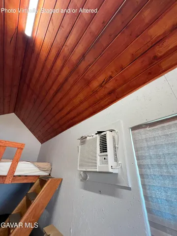 a kitchen with stainless steel appliances a stove a microwave a sink and cabinets