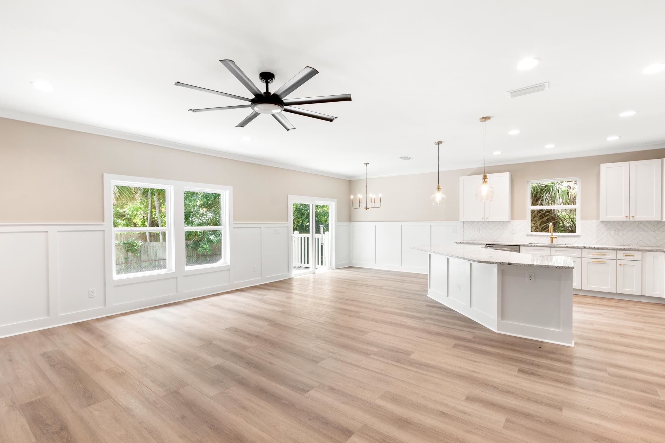 6334 Salado Road St. Augustine, FL 32080 - Photo 11 of 37 a view of an empty room with window and wooden floor