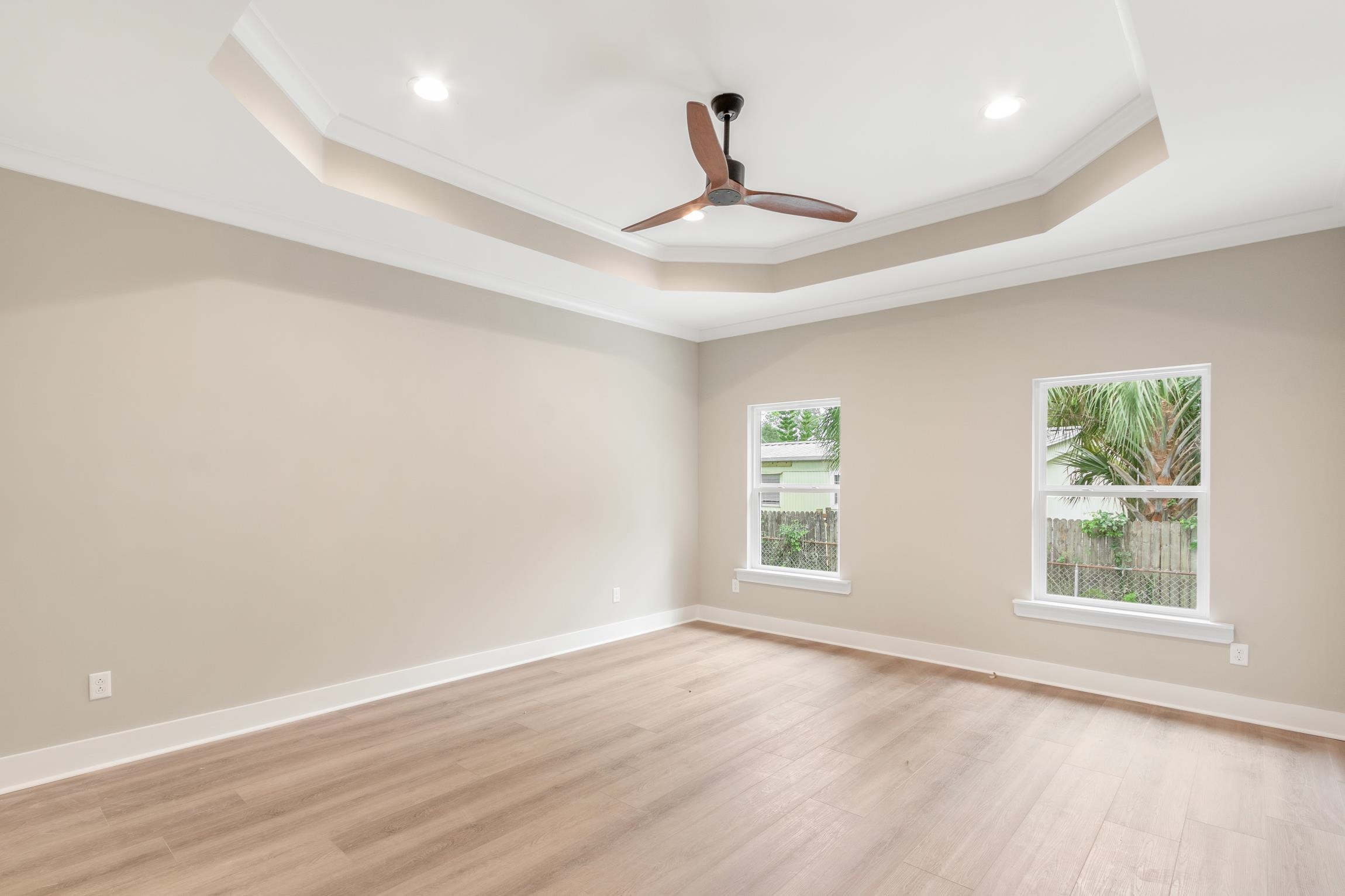 6334 Salado Road St. Augustine, FL 32080 - Photo 16 of 37 wooden floor in an empty room with a window
