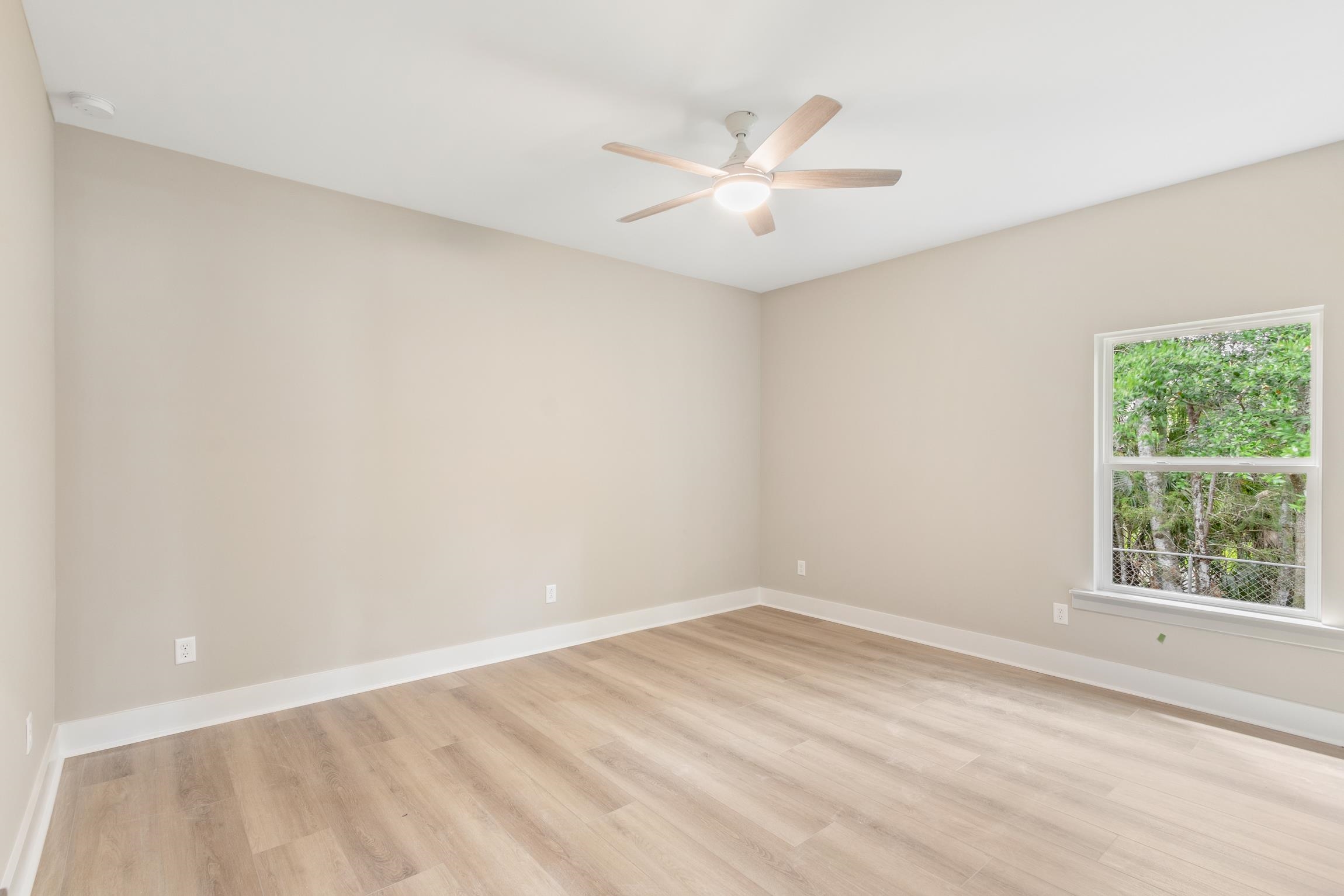 6334 Salado Road St. Augustine, FL 32080 - Photo 23 of 37 an empty room with a window