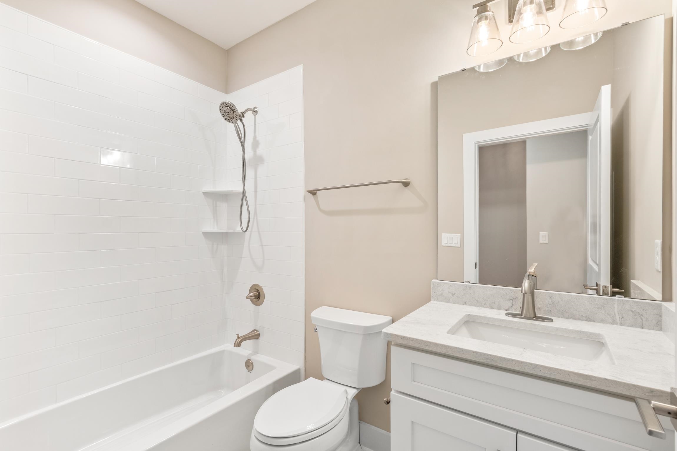 6334 Salado Road St. Augustine, FL 32080 - Photo 24 of 37 a bathroom with a sink a toilet and shower