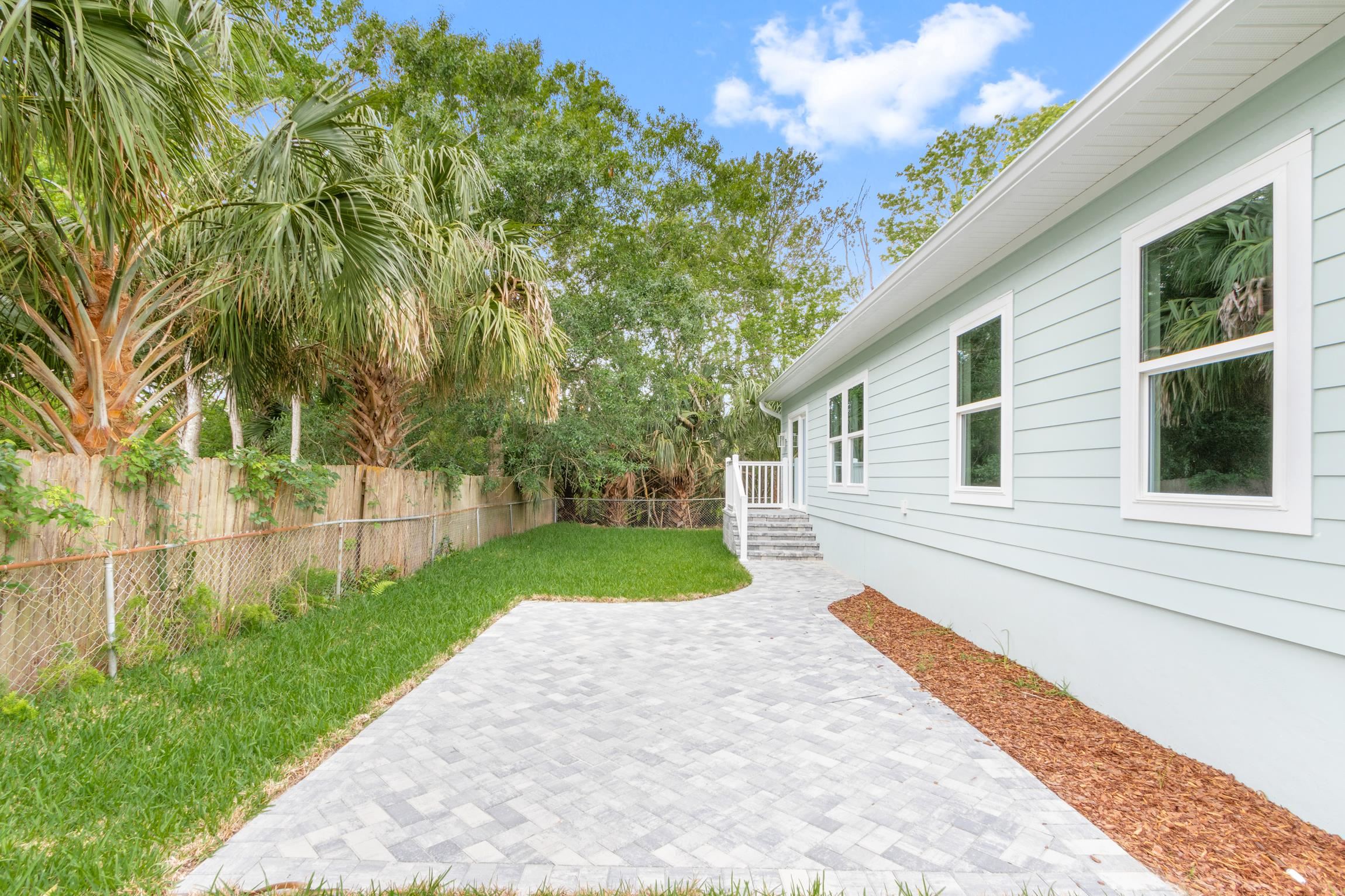 6334 Salado Road St. Augustine, FL 32080 - Photo 28 of 37 a porch with a yard
