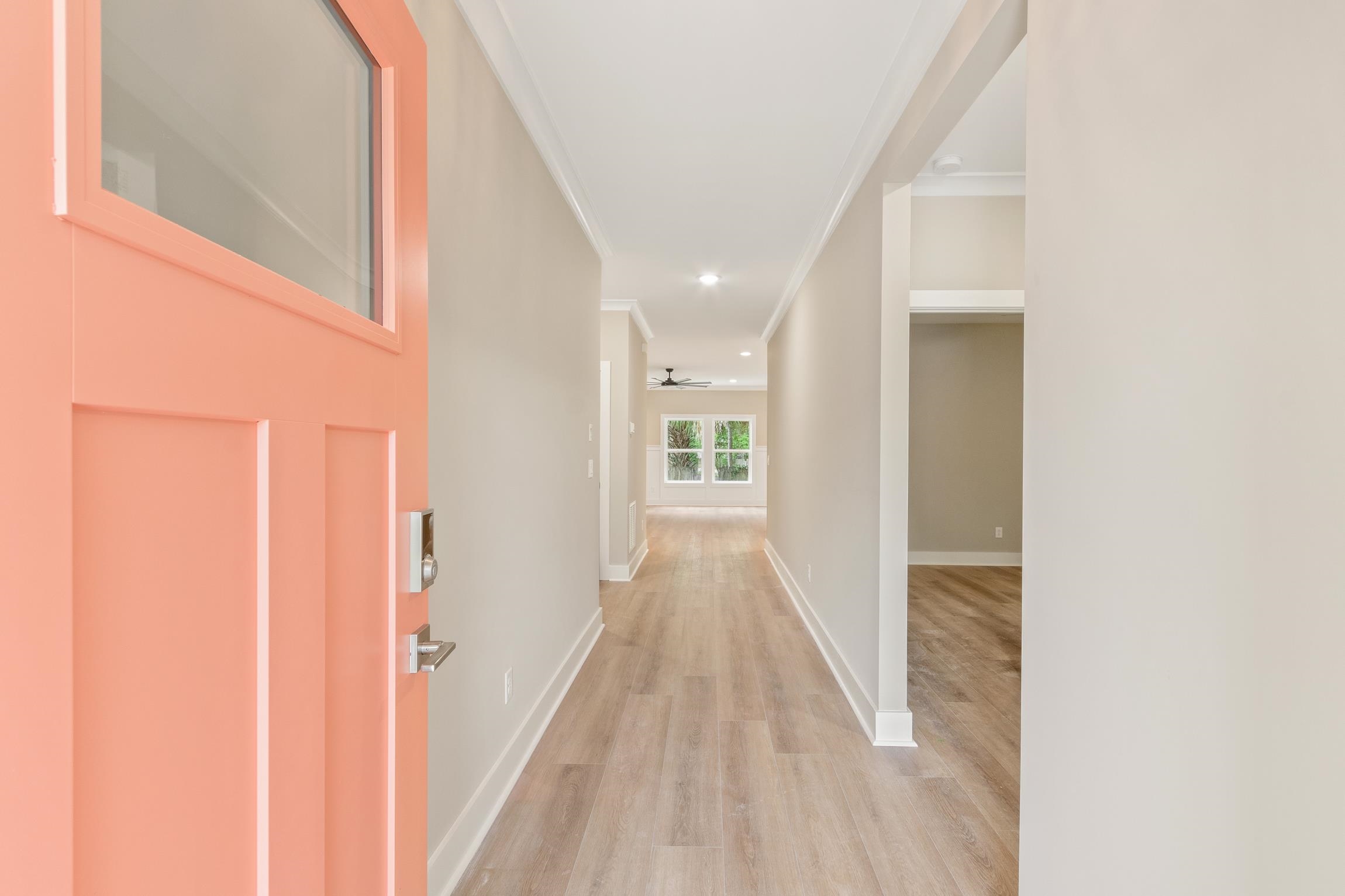 6334 Salado Road St. Augustine, FL 32080 - Photo 5 of 37 a view of a hallway with wooden floor