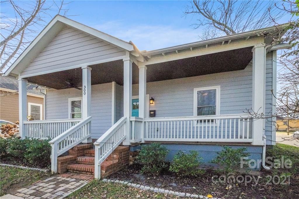 300 Mill Road Charlotte, NC 28216 - Photo 3 of 31 a view of a house with wooden fence