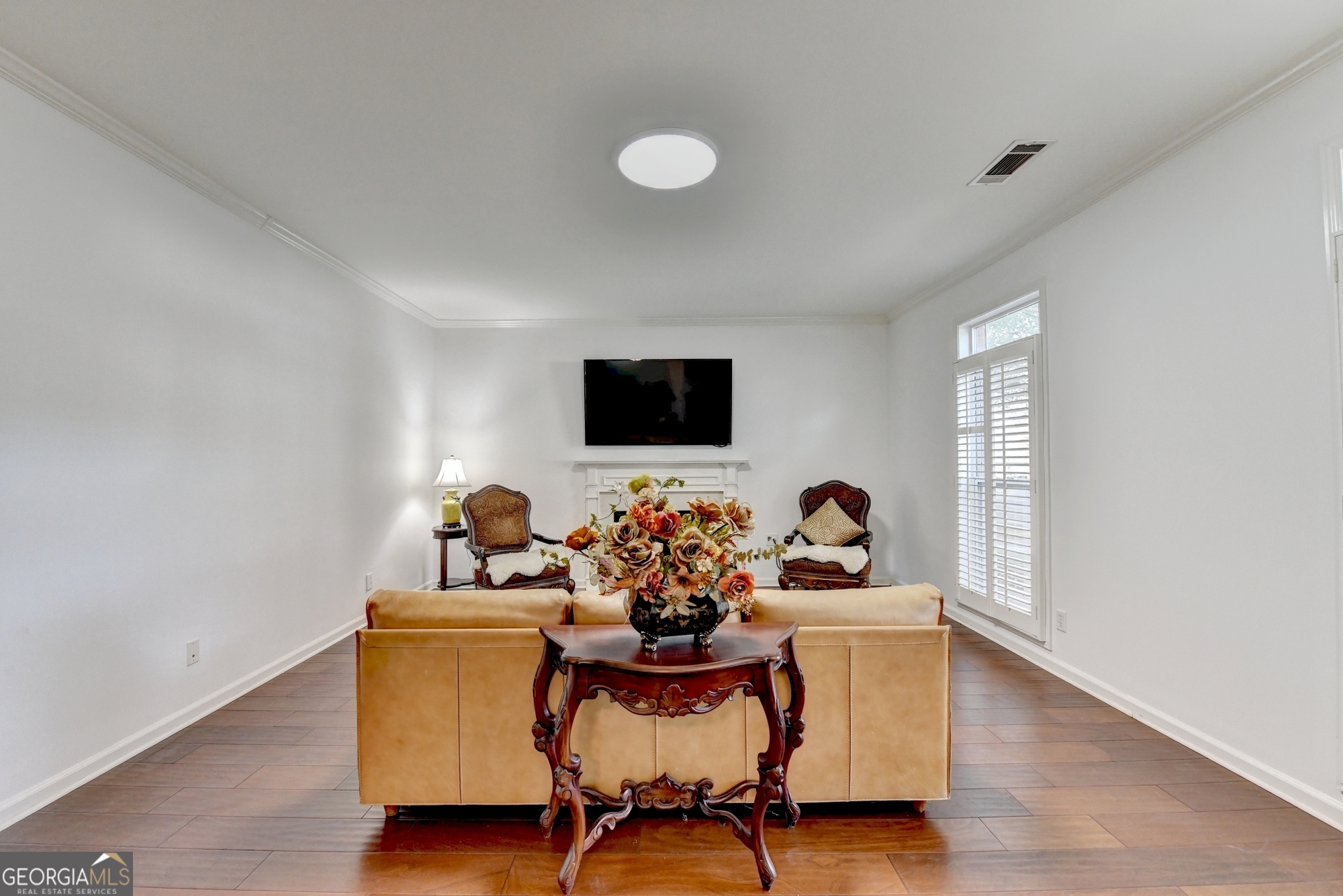 952 Cambron Cmns Trace Suwanee, GA 30024 - Photo 22 of 69 a dining room with furniture and wooden floor