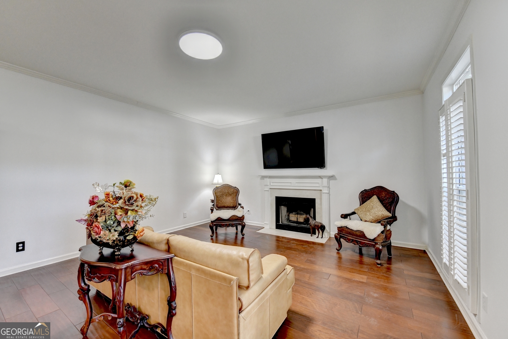 952 Cambron Cmns Trace Suwanee, GA 30024 - Photo 23 of 69 a living room with furniture and a fireplace