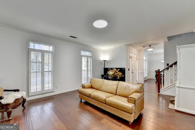 a bathroom with a shower and a window