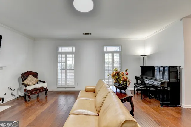 a view of walk in closet with clothes