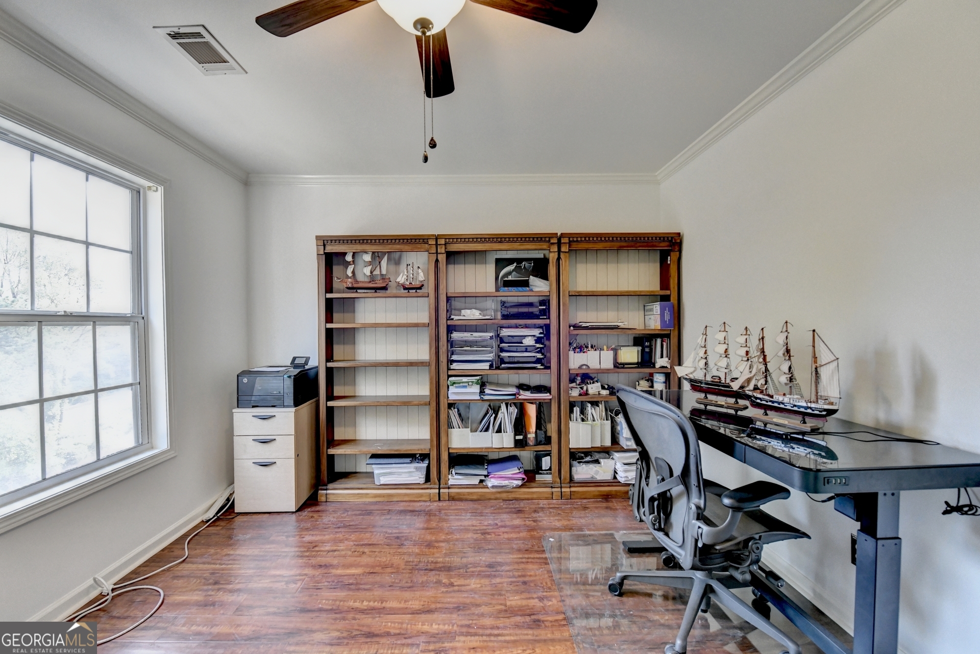 952 Cambron Cmns Trace Suwanee, GA 30024 - Photo 37 of 69 a view of a workspace with furniture and a window
