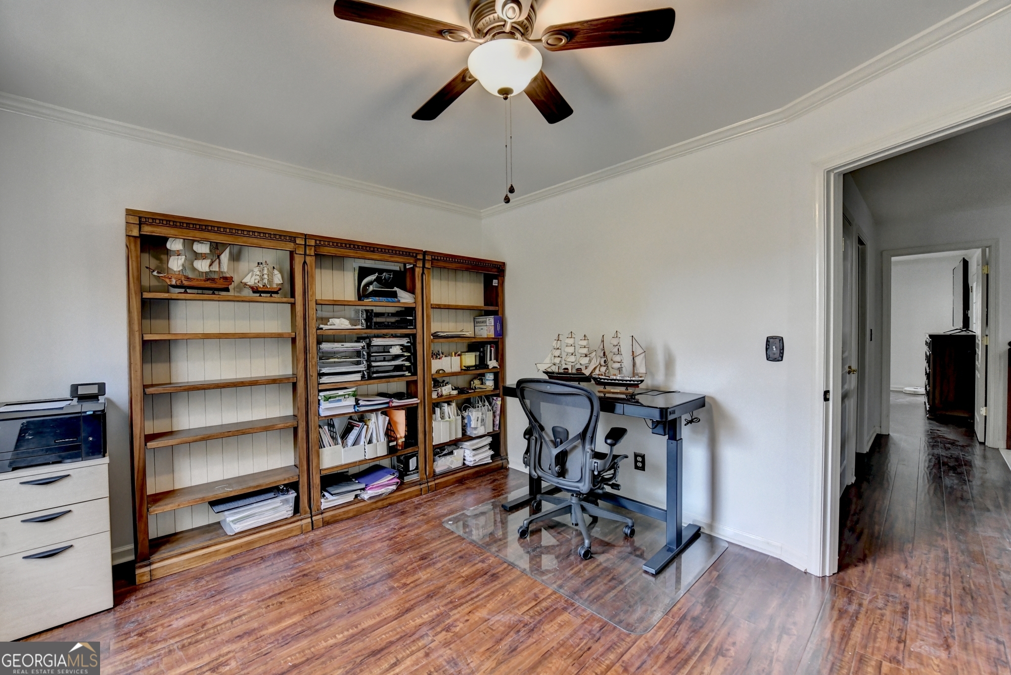 952 Cambron Cmns Trace Suwanee, GA 30024 - Photo 38 of 69 a view of a workspace with furniture and wooden floor