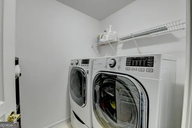 a swimming pool with outdoor seating and yard