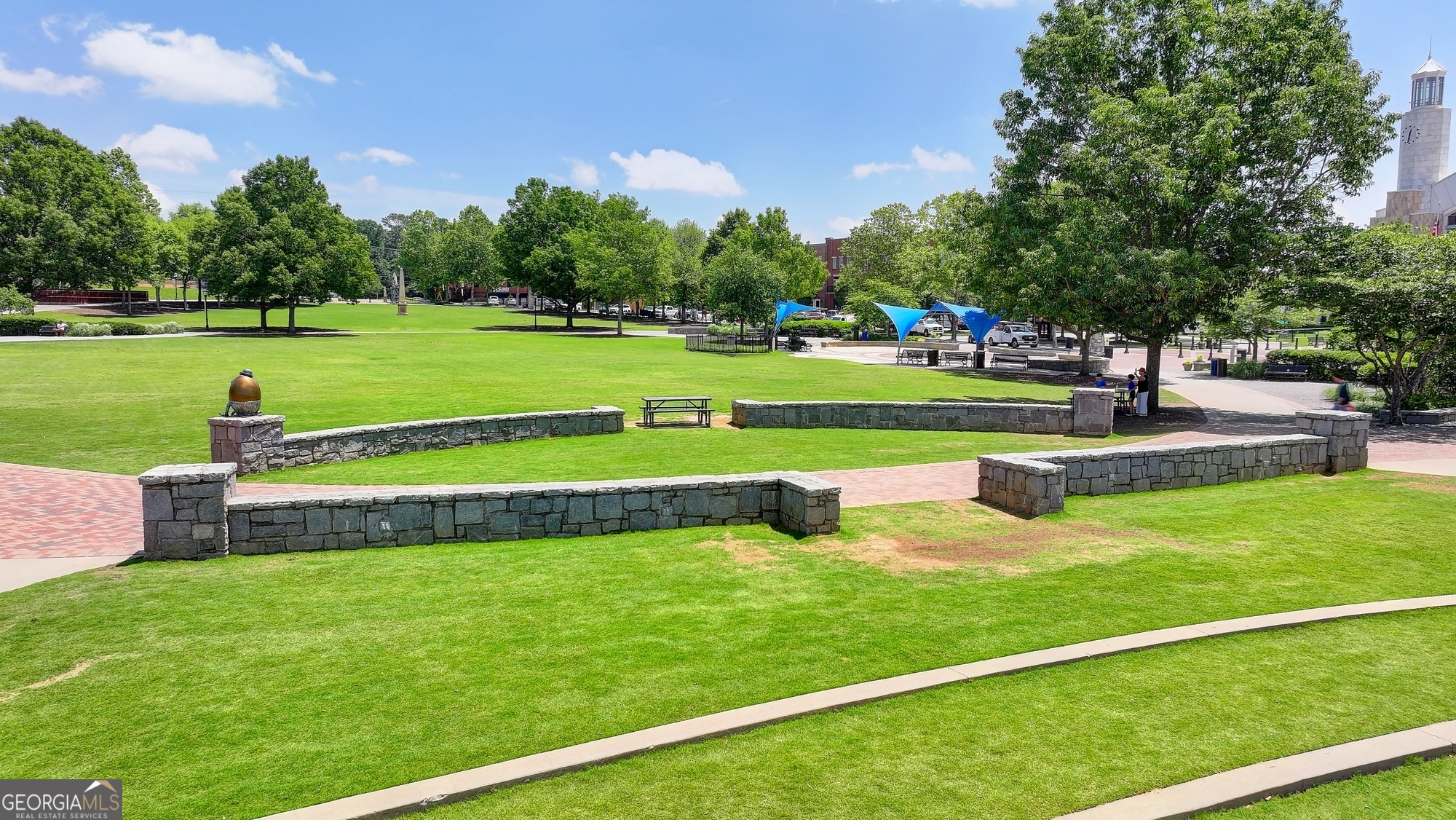952 Cambron Cmns Trace Suwanee, GA 30024 - Photo 60 of 69 a view of a park with large trees
