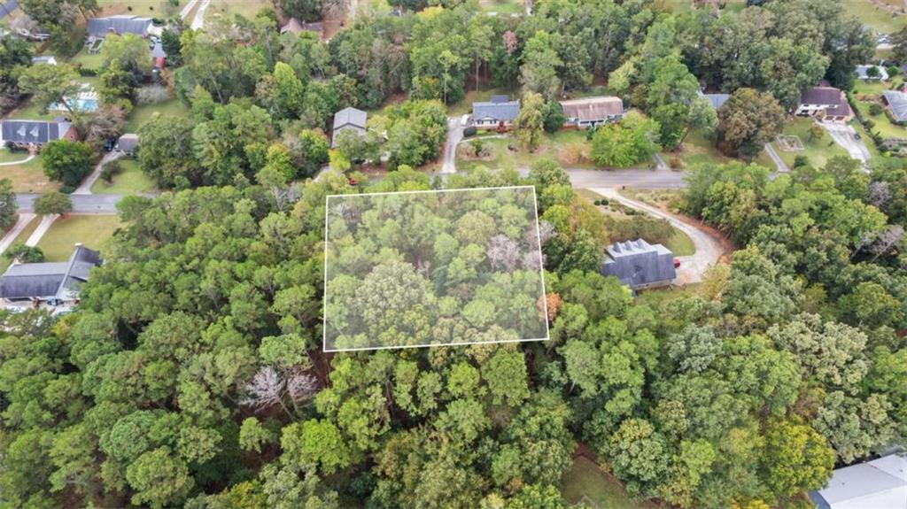 0 Warwick Way Rome, GA 30161 - Photo 3 of 7 a view of a lake with a building