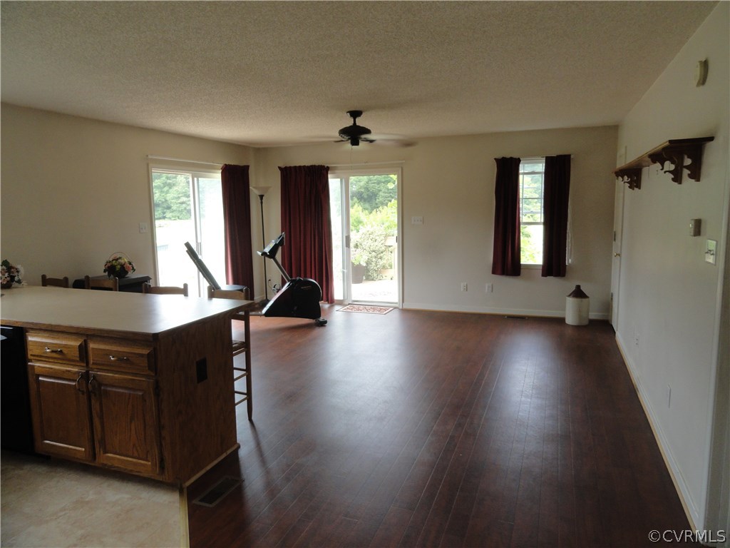 18670 Templeton Road Disputanta, VA 23842 - Photo 32 of 41 a living room with hard wood floors and a window