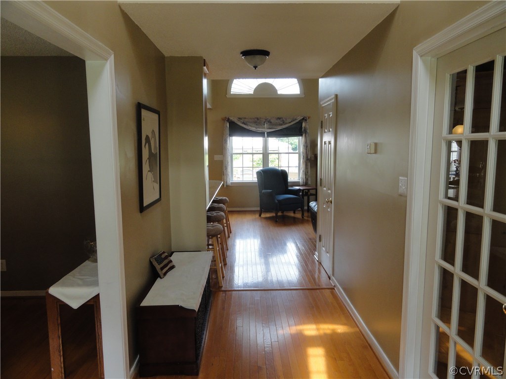 18670 Templeton Road Disputanta, VA 23842 - Photo 9 of 41 a view of hallway with furniture and a mirror