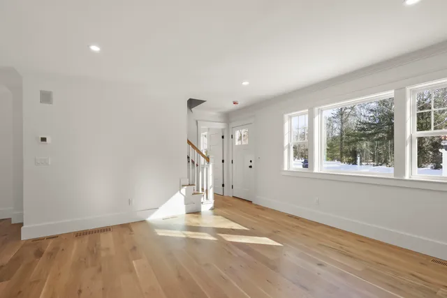 a bathroom with a toilet a sink and shower