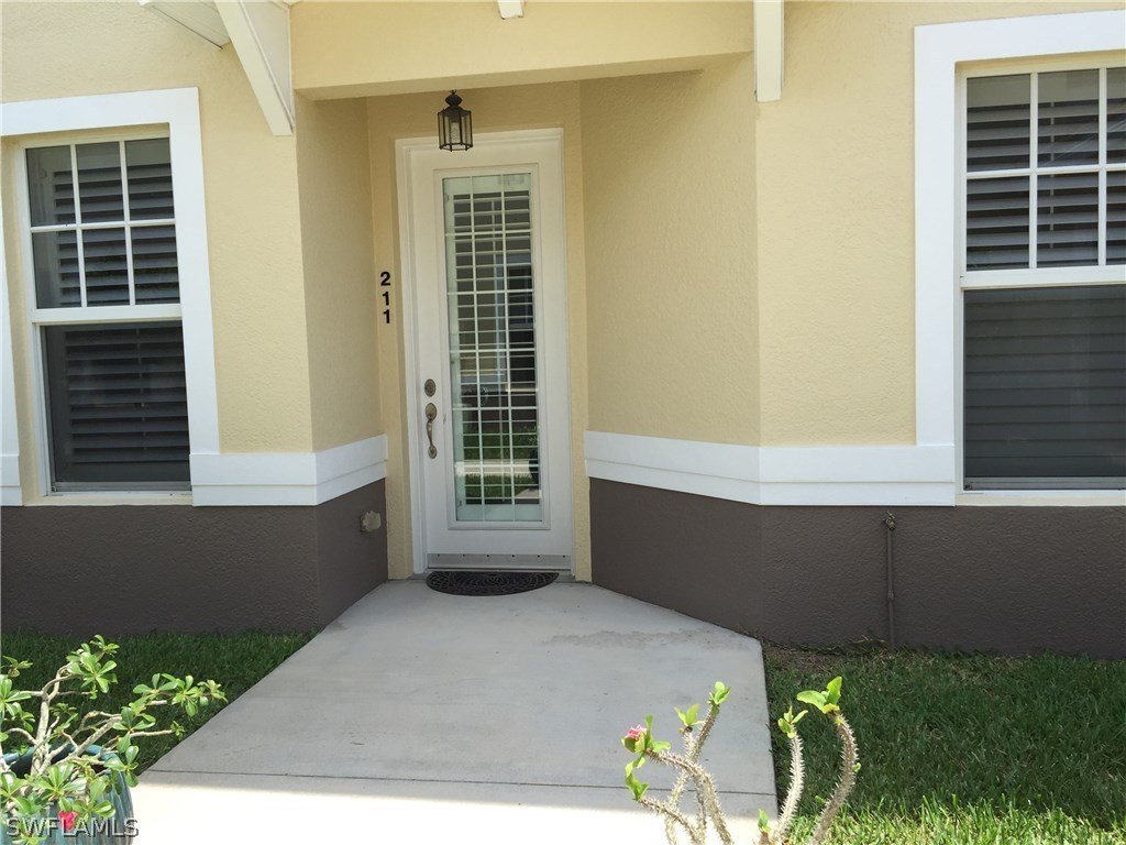 17210 Acapulco Road, Unit 211 Punta Gorda, FL 33955 - Photo 17 of 23 a view of front door of house