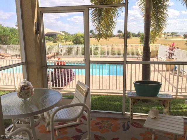 17210 Acapulco Road, Unit 211 Punta Gorda, FL 33955 - Photo 8 of 23 a view of a dining room with furniture window and outside view
