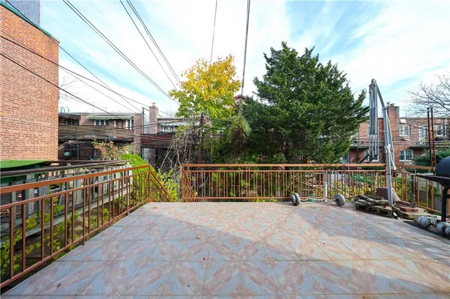 a view of street with balcony